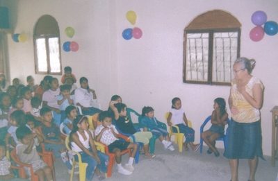 Missionary Ivete with orphans