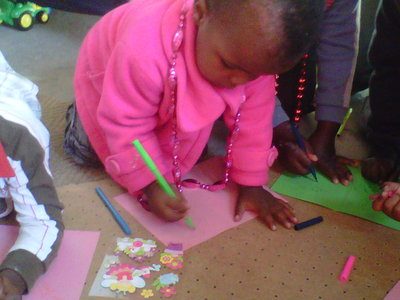 We love teaching the Orphaned children to colour in.