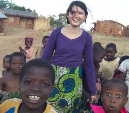Sarah Parlee in a local village with the children 