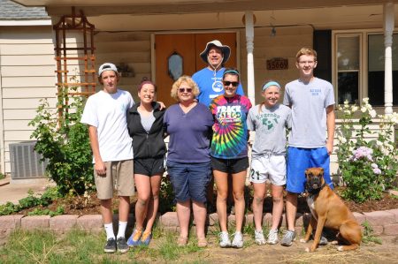 Workcamp crew with resident at home