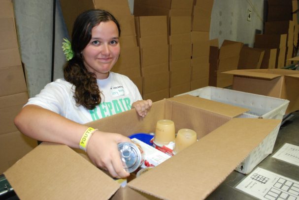 Participant packing food