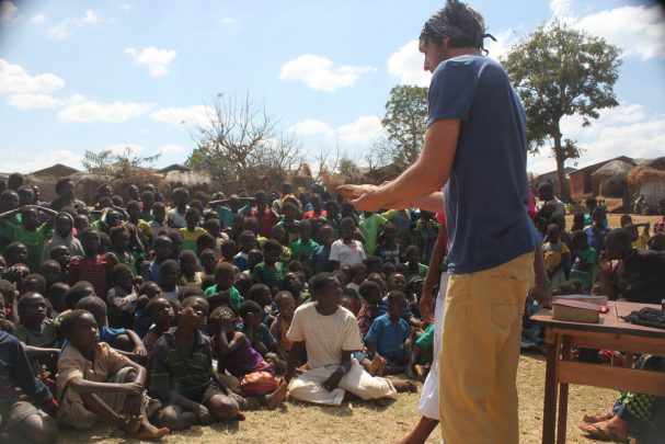A short-term worker sharing the Gospel in a Malawian village 